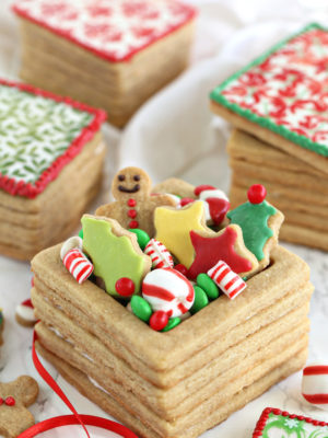 Close up of Edible Christmas Cookie Boxes with frosted cookies and candies overflowing from the top