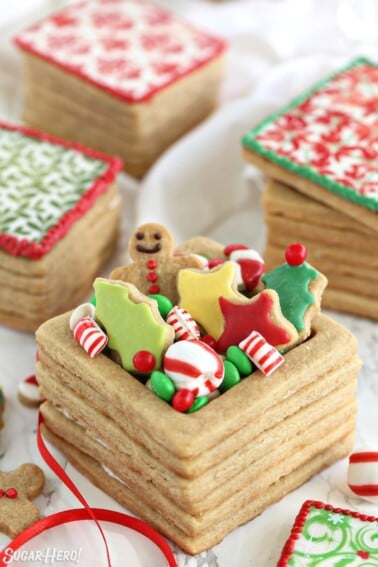 Close up of Edible Christmas Cookie Boxes with frosted cookies and candies overflowing from the top