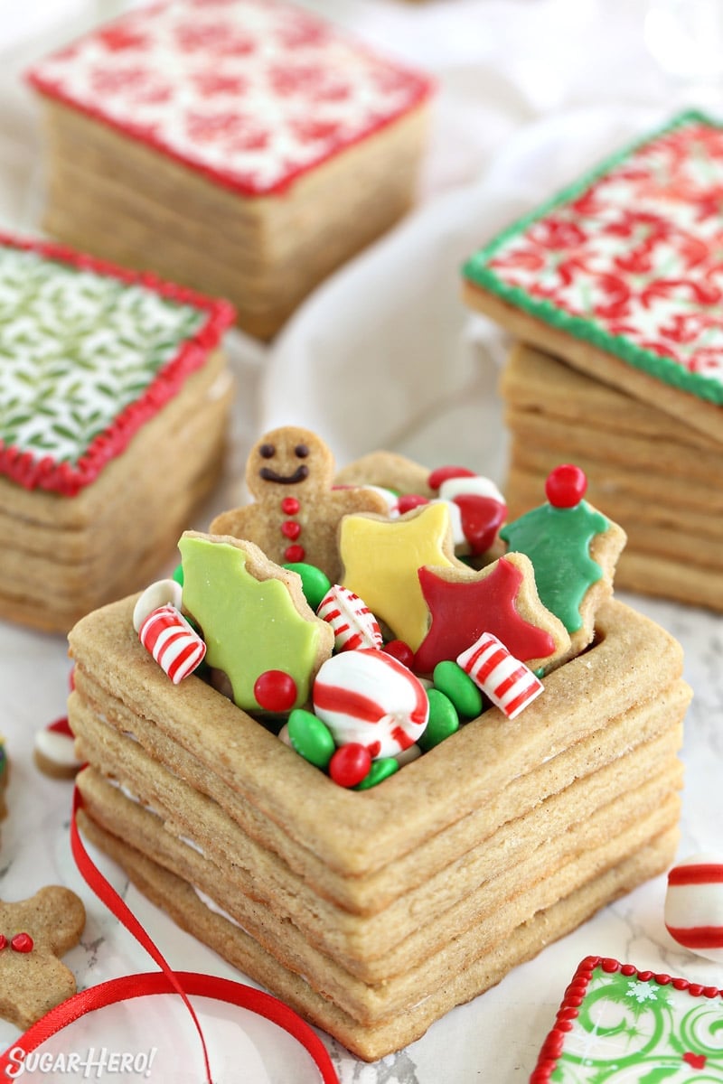 Close up of Edible Christmas Cookie Boxes with frosted cookies and candies overflowing from the top