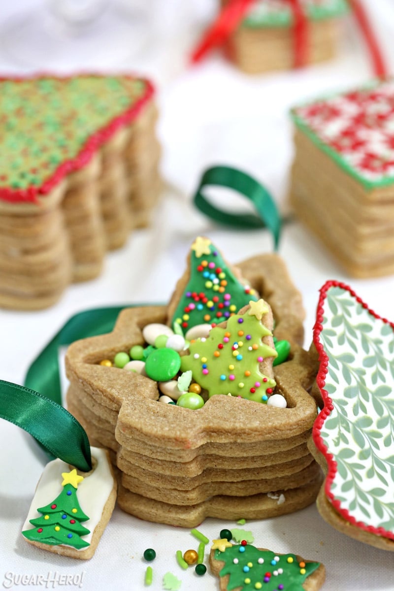 Christmas tree-shaped Edible Christmas Cookie Box with green cookies and candies inside