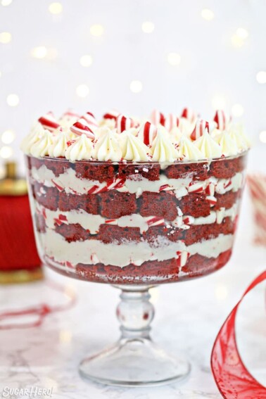 Red Velvet Trifle in a trifle bowl with peppermint pieces sprinkled on top