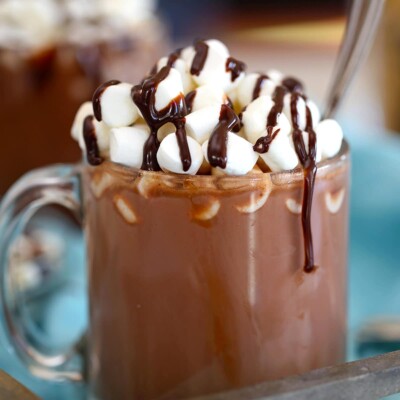 Slow Cooker Hot Chocolate in a glass mug with mini marshmallows on top