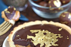 Photo of Baileys Chocolate Caramel Tarts with text overlay for Pinterest