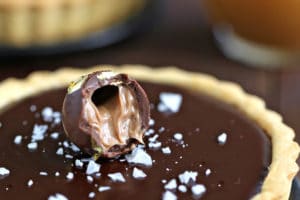 Photo of Baileys Chocolate Caramel Tarts with text overlay for Pinterest