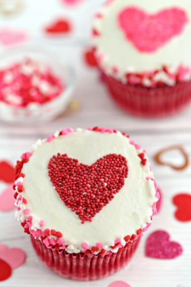 Sprinkle Heart Cupcakes with red sprinkle heart on top