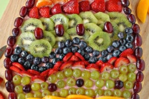 Easter Egg Fruit Pizza photo with text overlay for Pinterest.