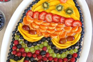 Easter Egg Fruit Pizza photo with text overlay for Pinterest.