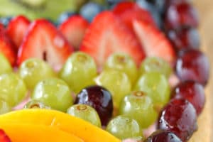 Easter Egg Fruit Pizza photo with text overlay for Pinterest.