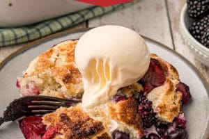 Picture of Mixed Berry Cobbler with text overlay for Pinterest.