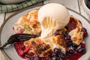 Picture of Mixed Berry Cobbler with text overlay for Pinterest