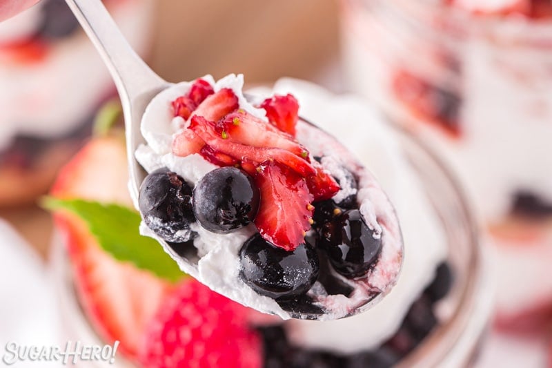 Close-up of spoonful of mixed berry shortcakes