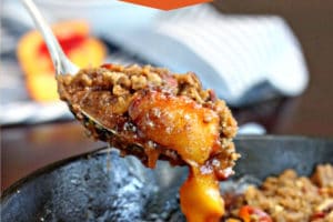 Picture of Cast Iron Peach Crisp with text overlay for Pinterest