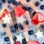 Close-up of fruit popsicles with pieces of star-shaped fruit inside.
