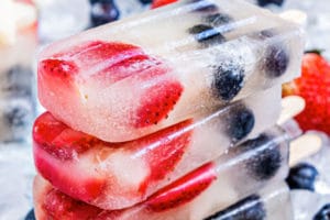 Photo of Red White & Blue Popsicles with text overlay for Pinterest