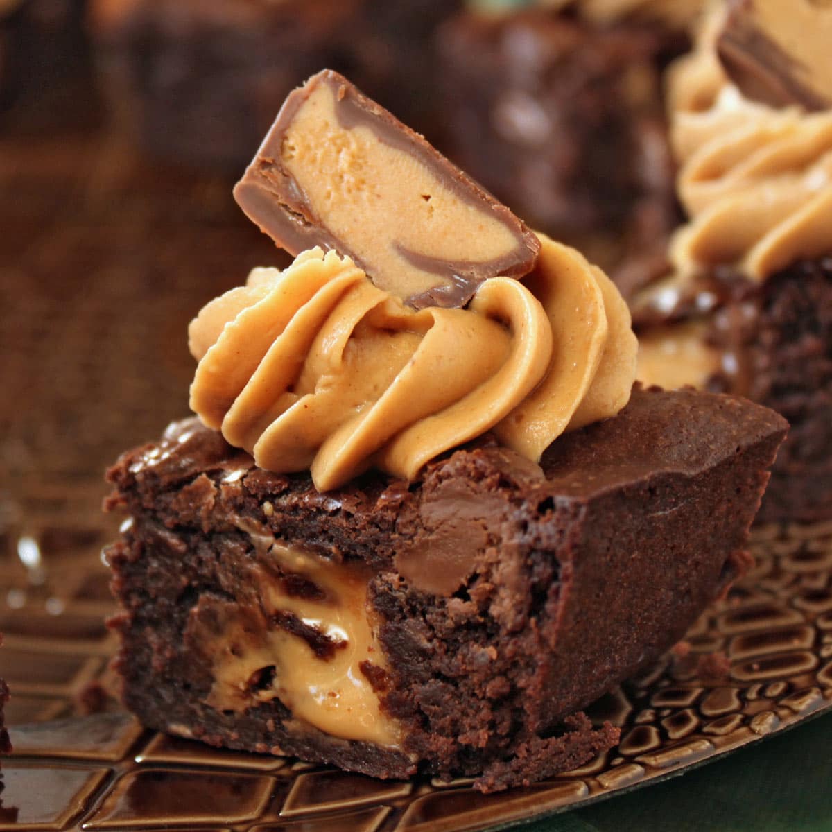 Close-up of peanut butter brownie with a gooey center.