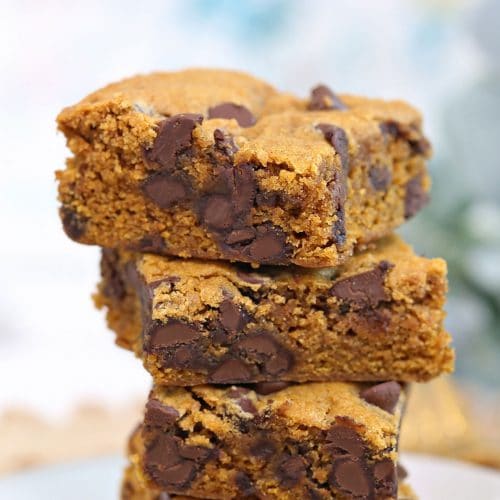 Stack of three Pumpkin Chocolate Chip Bars on top of each other.