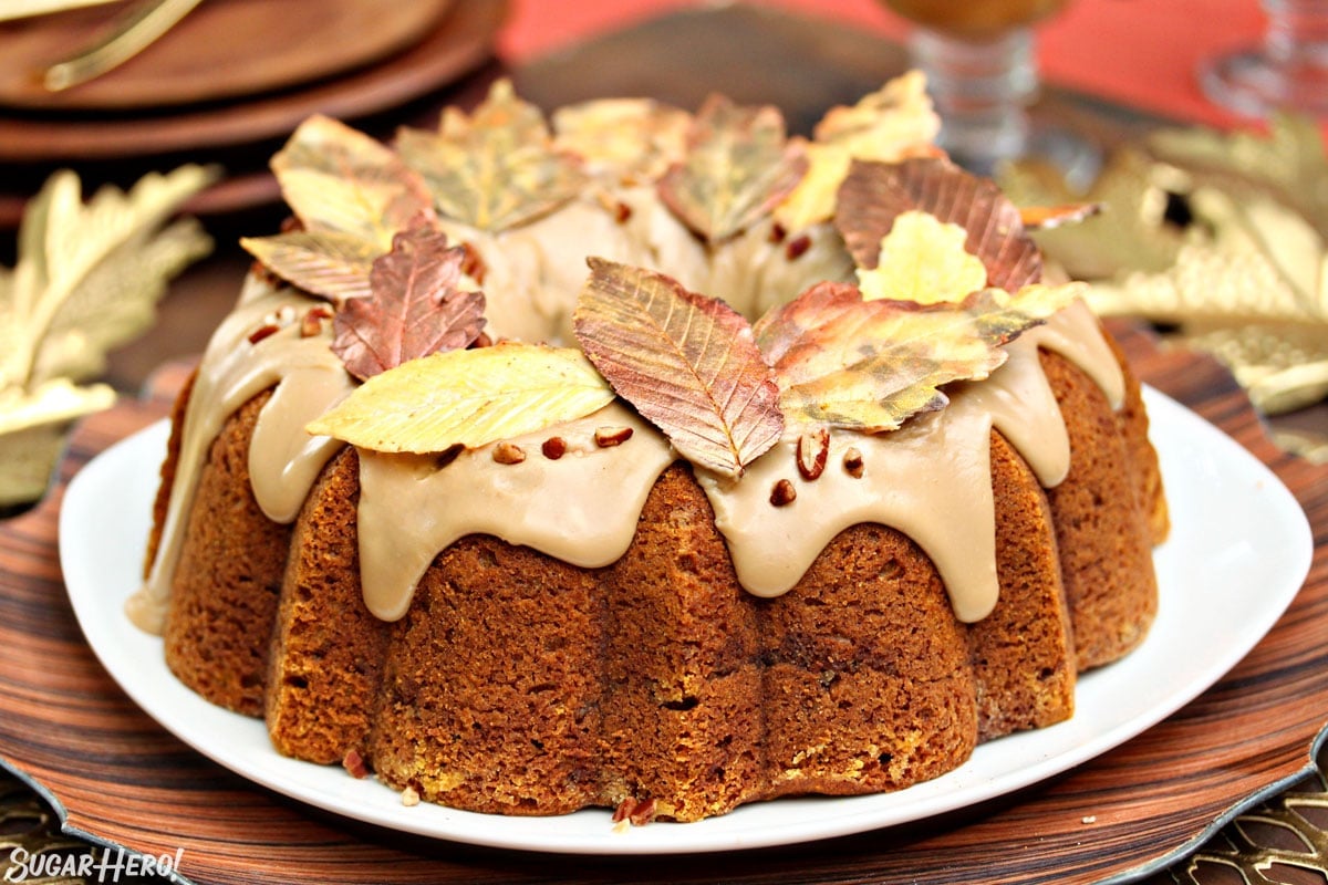 Pumpkin Pound Cake with brown sugar glaze and chocolate leaves on top.