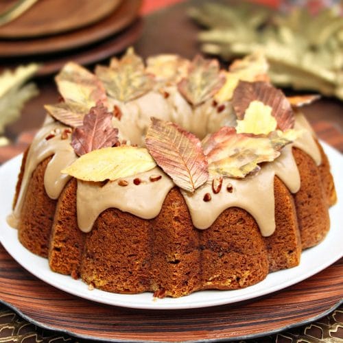 Pumpkin Pound Cake with brown sugar glaze and chocolate leaves on top.