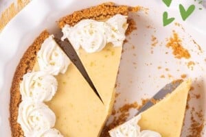 Key lime pie cut into 3 slices with the words "Key Lime Pie" overlaid above it.