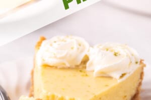A photo of a key lime pie cut into 3 slices.