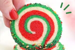 Photo of Christmas Pinwheel Cookies with text overlay for Pinterest