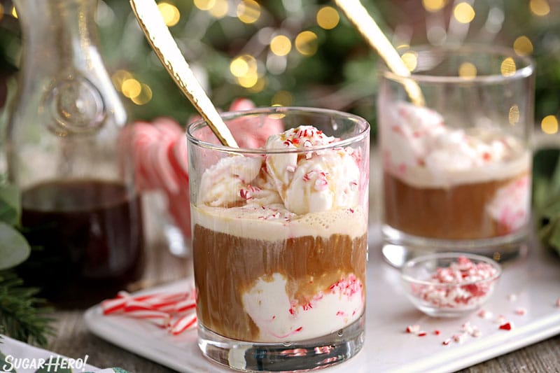 Two glasses of Peppermint Affogato with gold spoons sticking out of them.