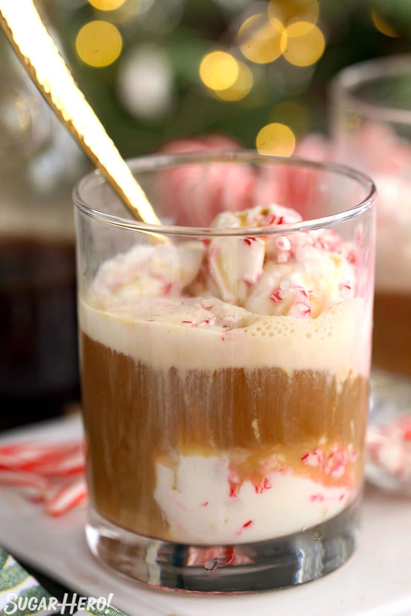 Peppermint Affogato in a clear glass with a gold spoon sticking out of the top.