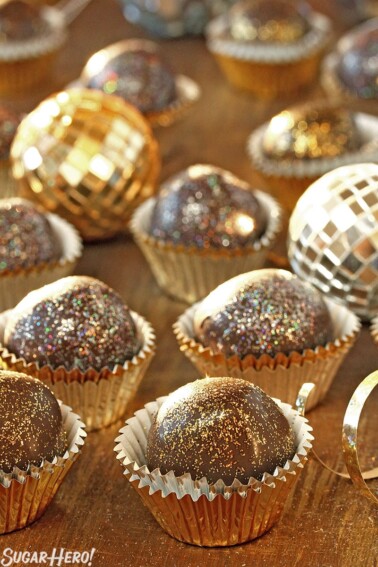 Arrangement of Sparkling Disco Chocolate Truffles on a wooden surface.