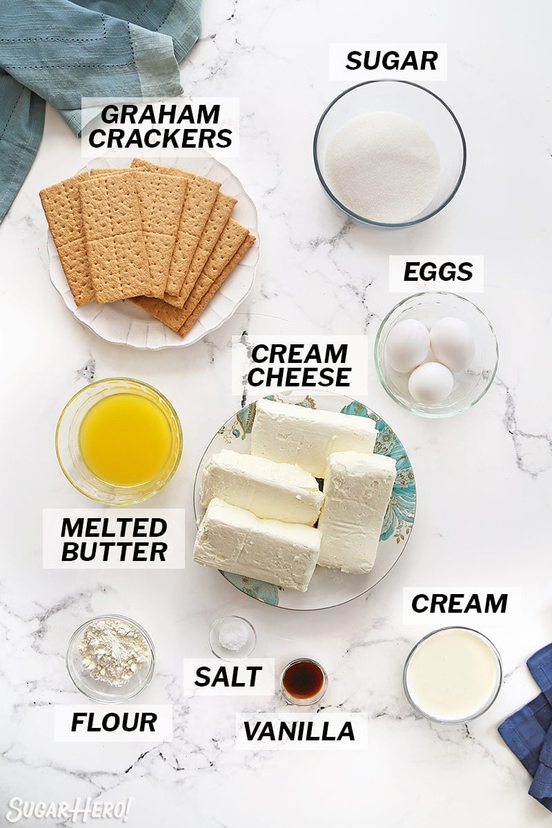 Overhead shot showing the ingredients needed to make a New York Style Cheesecake.