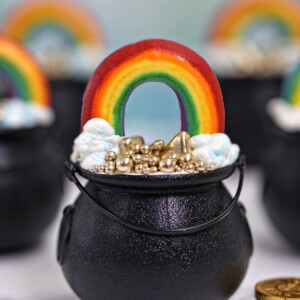Close-up of a Pot of Gold Cupcake with more cupcakes in the background.