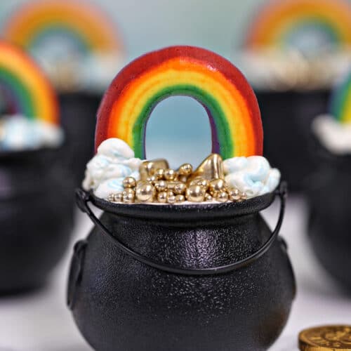 Close-up of a Pot of Gold Cupcake with more cupcakes in the background.