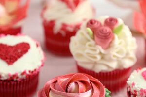 Picture of assorted Valentine's Day cupcakes with text overlay for Pinterest.