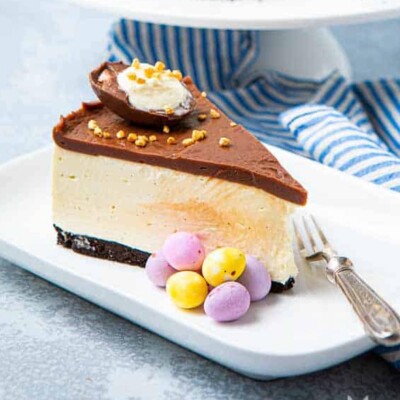Slice of Easter Egg Cheesecake for Easter cake round up.