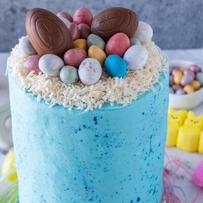 Close up of the top of a Tall Easter Cake with Peeps inside for Easter Cake round up.