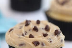 Photo of cupcake frosted with Cookie Dough Frosting with text overlay for Pinterest.