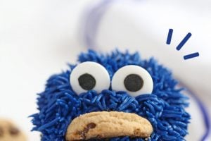 Photo of Cookie Monster Cupcakes with text overlay for Pinterest.