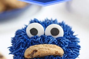 Photo of Cookie Monster Cupcakes with text overlay for Pinterest.