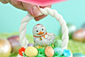 Photo of Easter Basket Cupcakes with text overlay for Pinterest