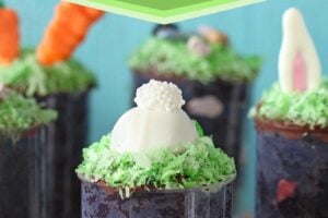 Pinterest collage showing Easter Push-Up Pops with text above that reads "Easter Cake Push-up Pops".