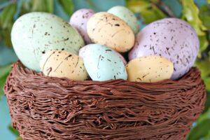 Photo of an Easter Nest Cake with text overlay for Pinterest.
