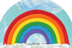 Fondant Rainbow Cake Topper photo with text overlay for Pinterest.