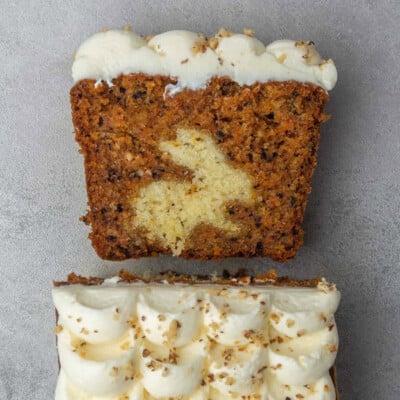 Carrot loaf cake slice with a white bunny baked inside.
