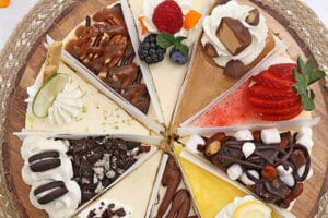 Photo of 10-Flavor Cheesecake Sampler with text overlay for Pinterest.