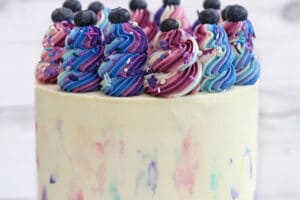 Photo of Blueberry Layer Cake with text overlay for Pinterest.