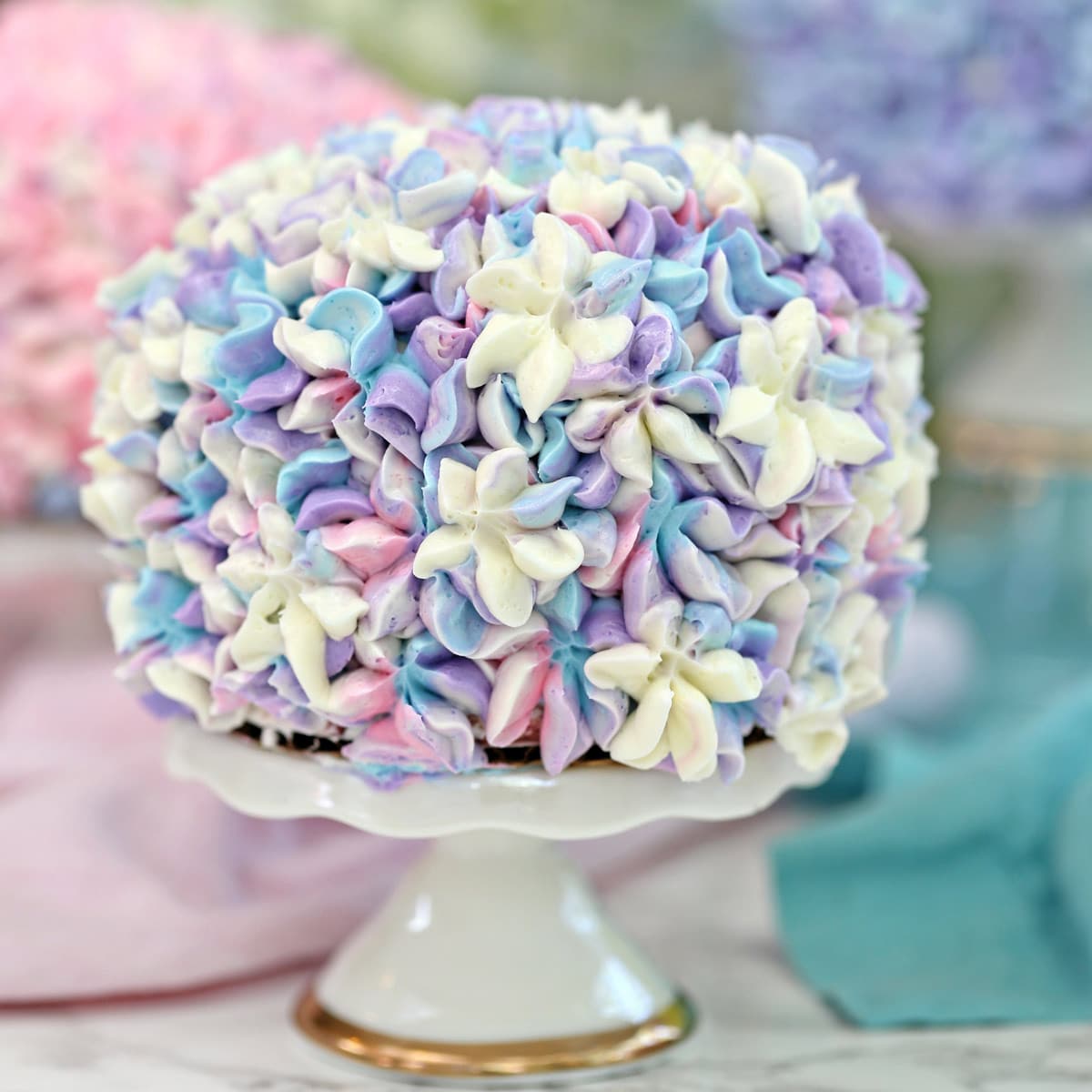 Close up of a multicolored Hydrangea Cake.