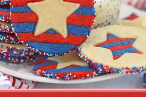 Photo of Stars and Stripes Sugar Cookies with text overlay for Pinterest.