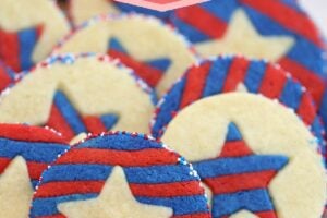 Photo of Stars and Stripes Sugar Cookies with text overlay for Pinterest.