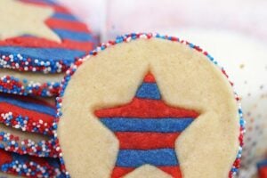 Photo of Stars and Stripes Sugar Cookies with text overlay for Pinterest.