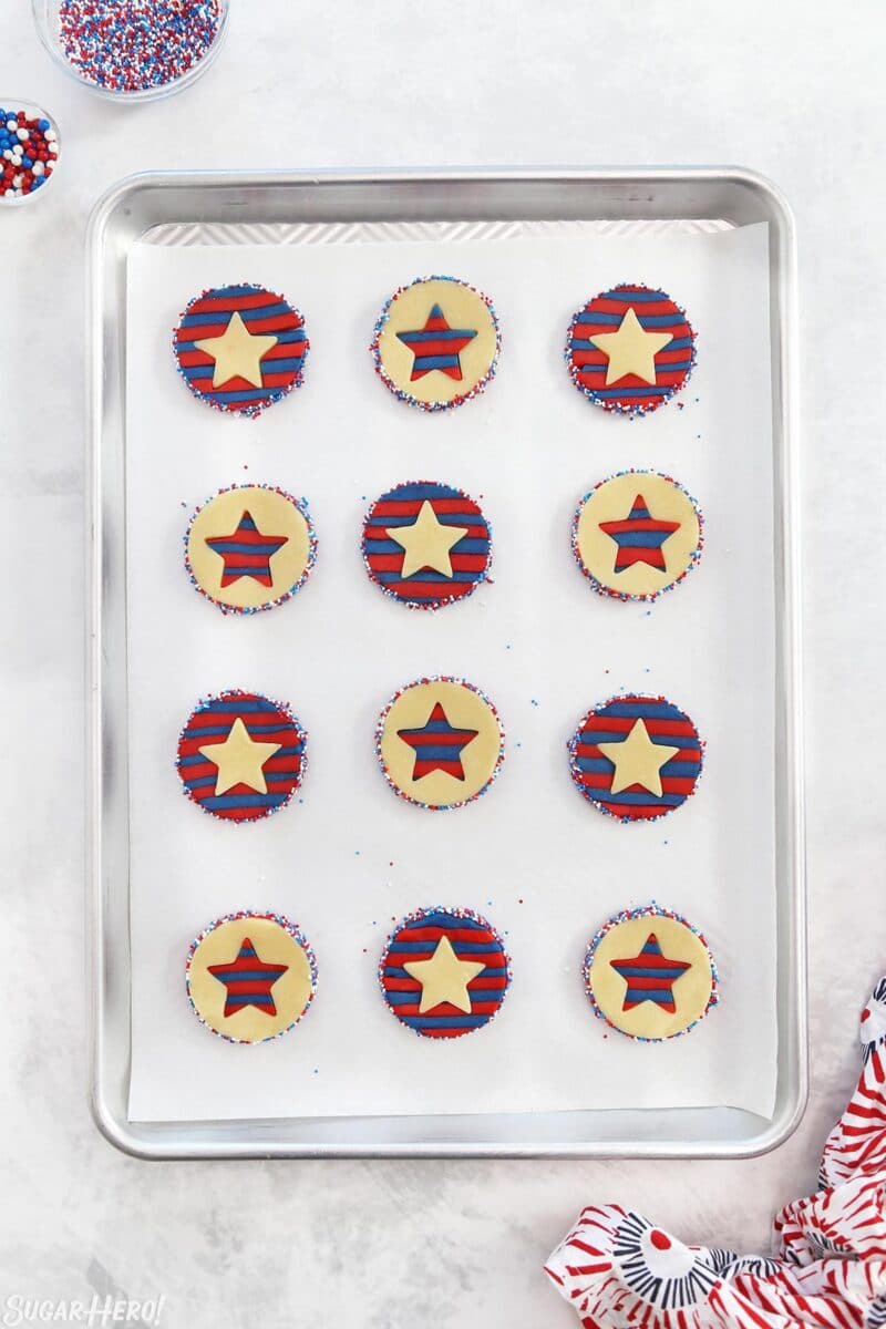 Overhead shot of Stars and Stripes Sugar Cookies on a silver baking sheet ready to bake.