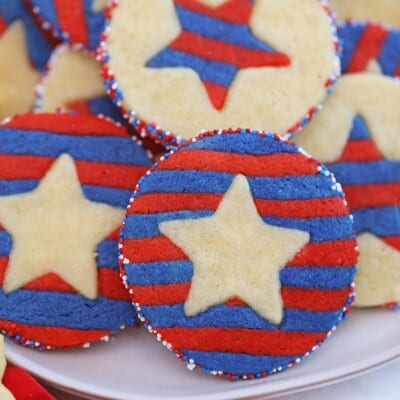 Close-up of red, white, and blue striped sugar cookie with a star embedded in the middle.